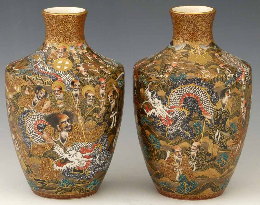 Pair of Japanese Satsuma vases decorated in enamels and: Pair of Japanese Satsuma vases decorated in enamels and gilt with dragons and immortals, red and gilt Dai Nippon Satsuma... mark to base height 18cm. Condition report: good condition.