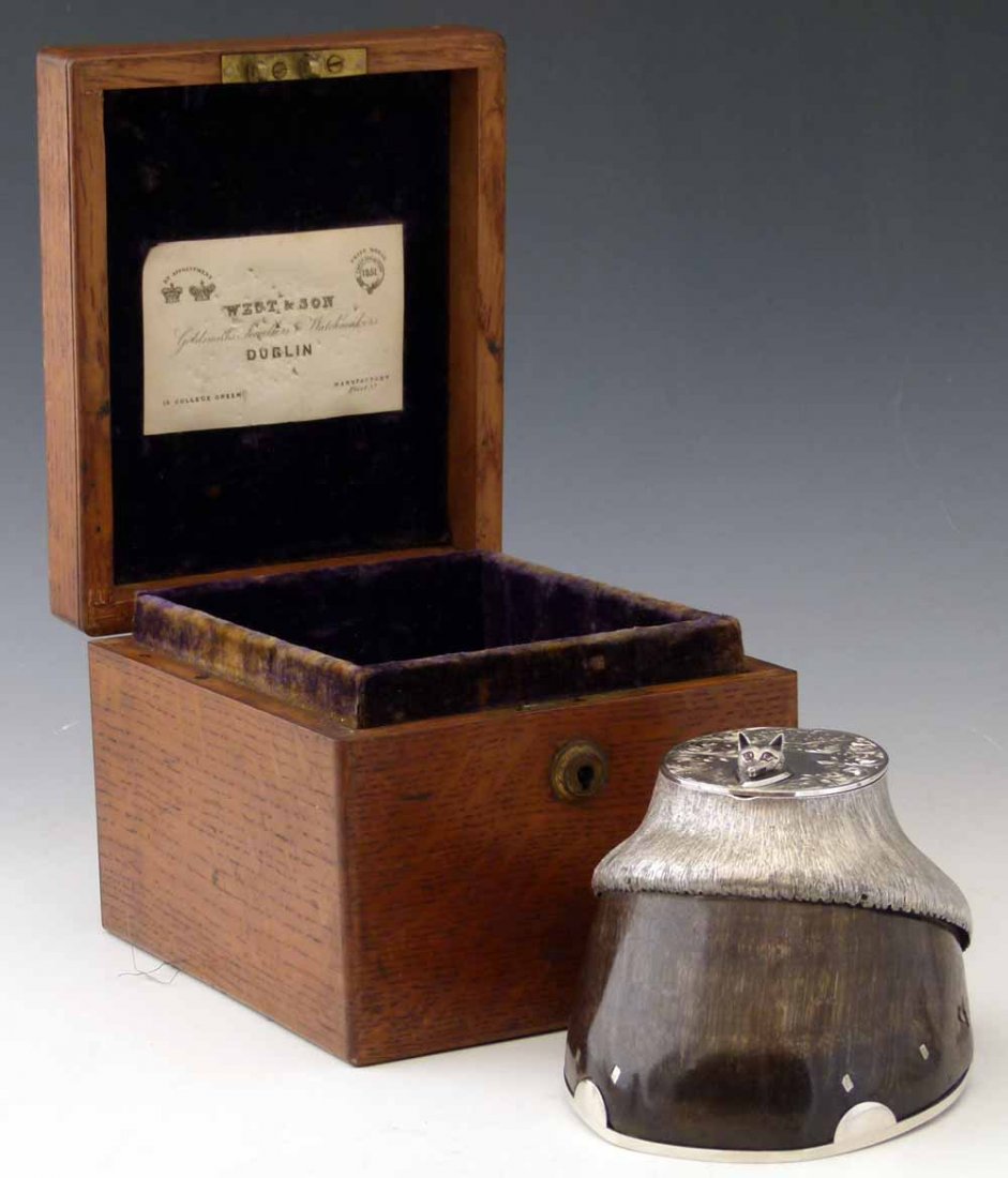 Horse's hoof with Irish silver mounts as an inkwell,: Horse's hoof with Irish silver mounts as an inkwell, Dublin 1857 by EJ for West & Son, the lid set with a ruby-eyed fox's head cover for the pen hole, inscribed " The Speaker, died 27th May 1857, aged