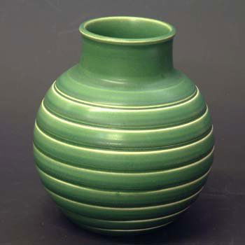Keith Murray Wedgwood vase: Wedgwood Keith Murray vase with globular body and short neck moulded with bands, decorated with an overall green glaze, impressed and printed marks including Keith Murray facsimile signature, (small c