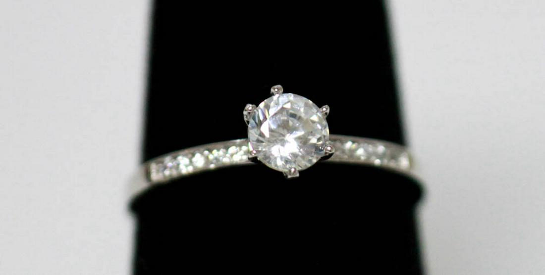 .925 STERLING SILVER CLEAR CZ SOLITAIRE RING: .925 STERLING SILVER CLEAR CZ SOLITAIRE RING -- .925 STERLING SILVER CLEAR CZ SOLITAIRE RING SIZE: 8 #21ST68449