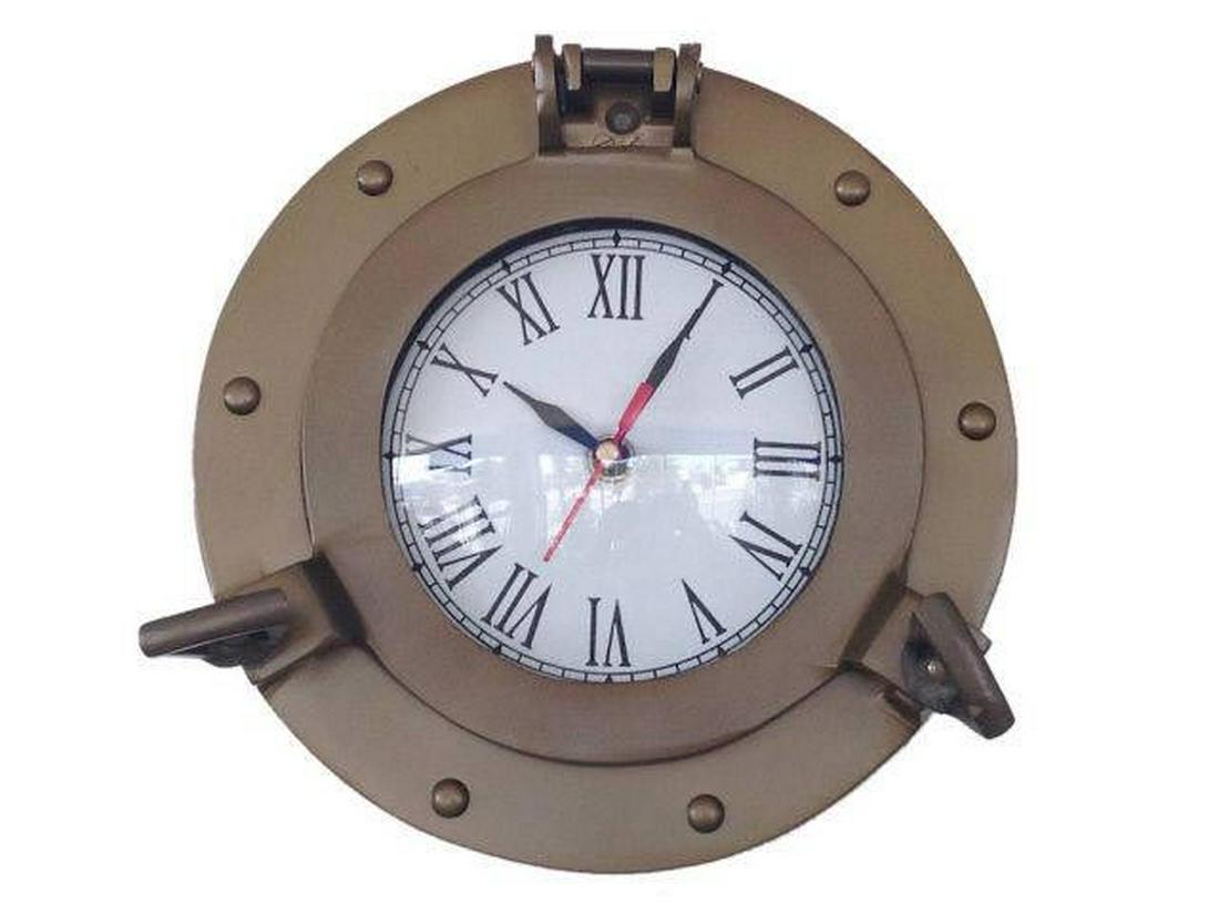 Antique Brass Decorative Ship Porthole Clock 8in.: Antique Brass Decorative Ship Porthole Clock 8in. -- The Antique Brass Ship Porthole Clock is a classy and quality accent piece to add to any nautical themed room. This charming vintage nautical port