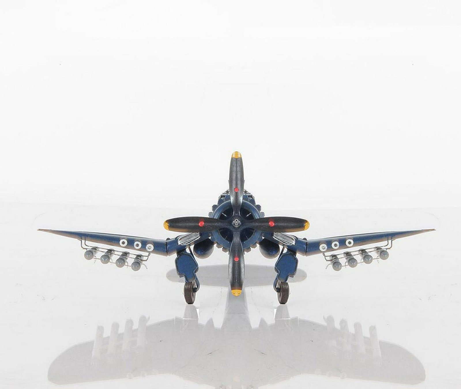 1944 F4U-4 CORSAIR WII 1:40-SCALE: 1944 F4U-4 CORSAIR WII 1:40-SCALE -- Fly back in time with this 1944 F4U Corsair which was known to be one of the best fighters in the war. It?s handcrafted in iron frame with a scale of 1:40. This F4