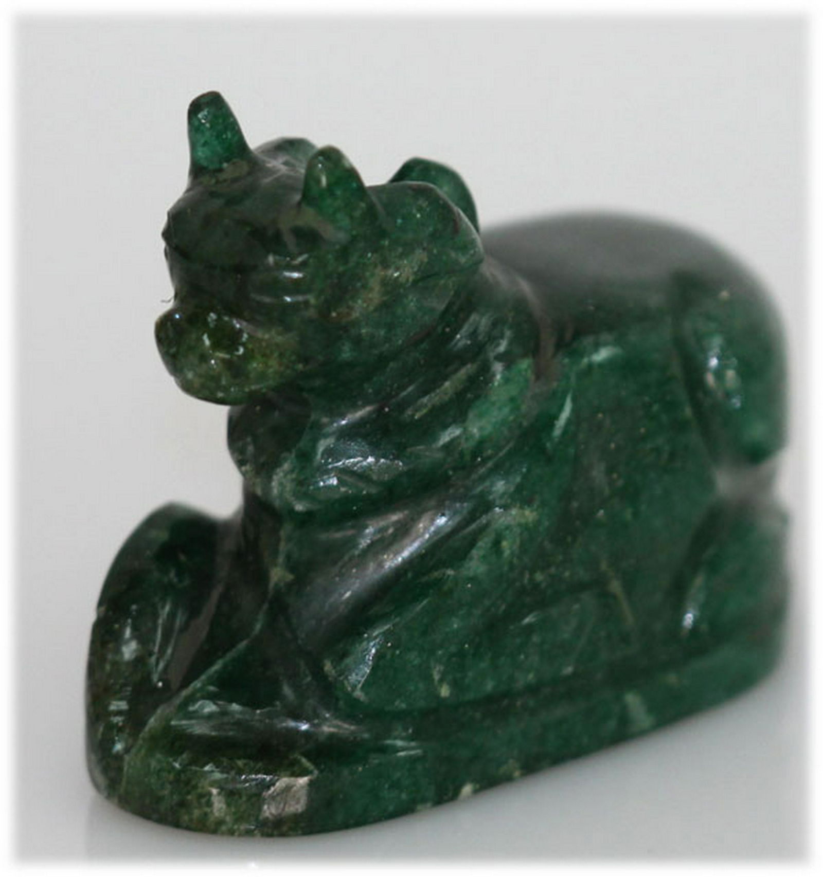 NATURAL 233.07 CTW MALACHITE MEDIUM COW FIGURE: NATURAL 233.07 CTW MALACHITE MEDIUM COW FIGURE -- NATURAL 233.07 CTW MALACHITE MEDIUM COW FIGURE; MAINSTONE MALACHITE; HAND MADE FIGURE;TOTAL WEIGHT 233.07 CTW; EST. SIZE 1 1/2 - 1 3/4 #21ST21258