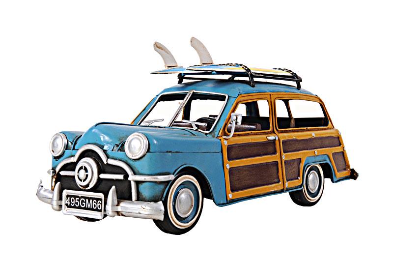 1949 GREEN FORD WAGON CAR W/TWO SURFBOARDS: 1949 GREEN FORD WAGON CAR W/TWO SURFBOARDS -- Take a ride back into history with this 1949 Ford Woody Wagon model. An American automobile produced by the Ford Motor Company after World War II. It is m