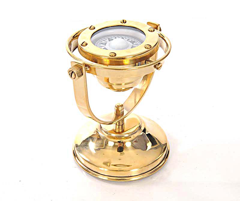 Gimbaled Compass: Gimbaled Compass -- This is a fully functional gimbaled compass. It is made of high quality brass tinted with a golden glow. Each component is crafted with the finest craftsmanship. Available in shiny