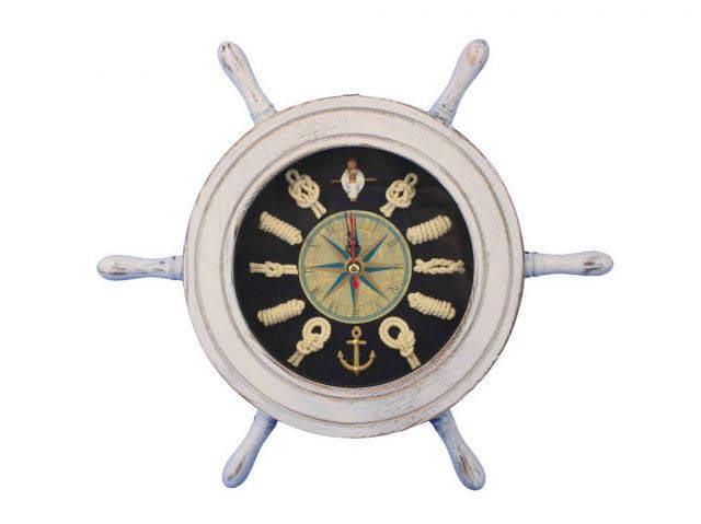 Wooden Whitewashed Ship Wheel with Dark Blue Knot Face: Wooden Whitewashed Ship Wheel with Dark Blue Knot Face Clock 12in. -- The Wooden Whitewashed Ship Wheel with Dark Blue Knot Faced Clock 12in. is one of our most popular decorative clocks.Classy and fu