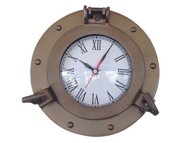 Antique Brass Decorative Ship Porthole Clock 8in.: Antique Brass Decorative Ship Porthole Clock 8in. -- The Antique Brass Ship Porthole Clock is a classy and quality accent piece to add to any nautical themed room. This charming vintage nautical port