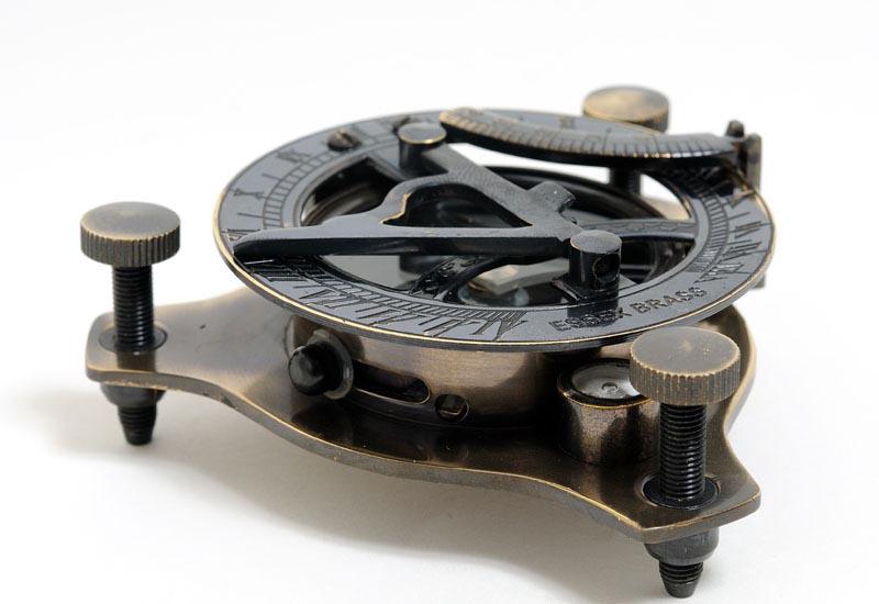 Sundial Compass in wood box: Sundial Compass in wood box -- This is a fully functional sundial compass. It is made from high quality brass. Each component is crafted with the finest craftsmanship. It contains a foot screw and cir