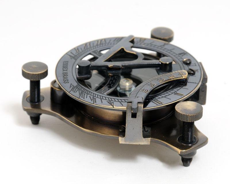 Sundial Compass in wood box: Sundial Compass in wood box -- This is a fully functional sundial compass. It is made of high quality brass. Each component is crafted with the finest craftsmanship. It contains a foot screw and circu