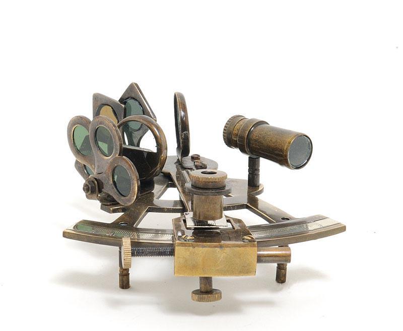Nautical Sextant in wood box: Nautical Sextant in wood box -- This is a fully functional nautical sextant. It is made of high quality brass. Each component is crafted with the finest craftsmanship. Available in antique brass finis