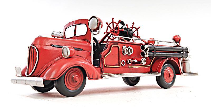 ?RED FIRE ENGINE FORD 1:40-SCALE: ?RED FIRE ENGINE FORD 1:40-SCALE -- Fight the fire with this classic 1938 Ford Fire Engine Truck model. It is made of iron and has a scale of 1:40. It features many intricate details such as fenders w