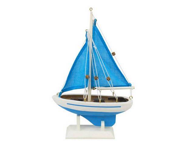 Wooden Light Blue with Light Blue Sails Pacific Sailer: Wooden Light Blue with Light Blue Sails Pacific Sailer Model Sailboat Decoration 9in. -- Brighten your day or any room of your home with this delightfully fun Pacific Sailer sailboat decoration 9in.. 