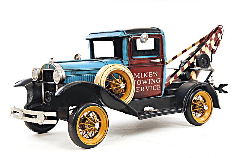 1931 FORD MODEL A TOW TRUCK 1:12-SCALE: 1931 FORD MODEL A TOW TRUCK 1:12-SCALE -- In March 1930 Ford Model A sales hit three million and there were nine body styles available. One of them was the Ford Model A Tow Truck. Today you can own th