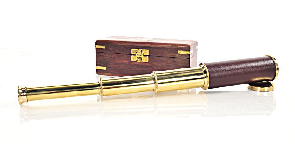 Handheld Telescope in wood box: Handheld Telescope in wood box -- This hand held telescope is made of high quality brass. Each component is crafted with the finest craftsmanship. It comes with black leather overlay and is available 
