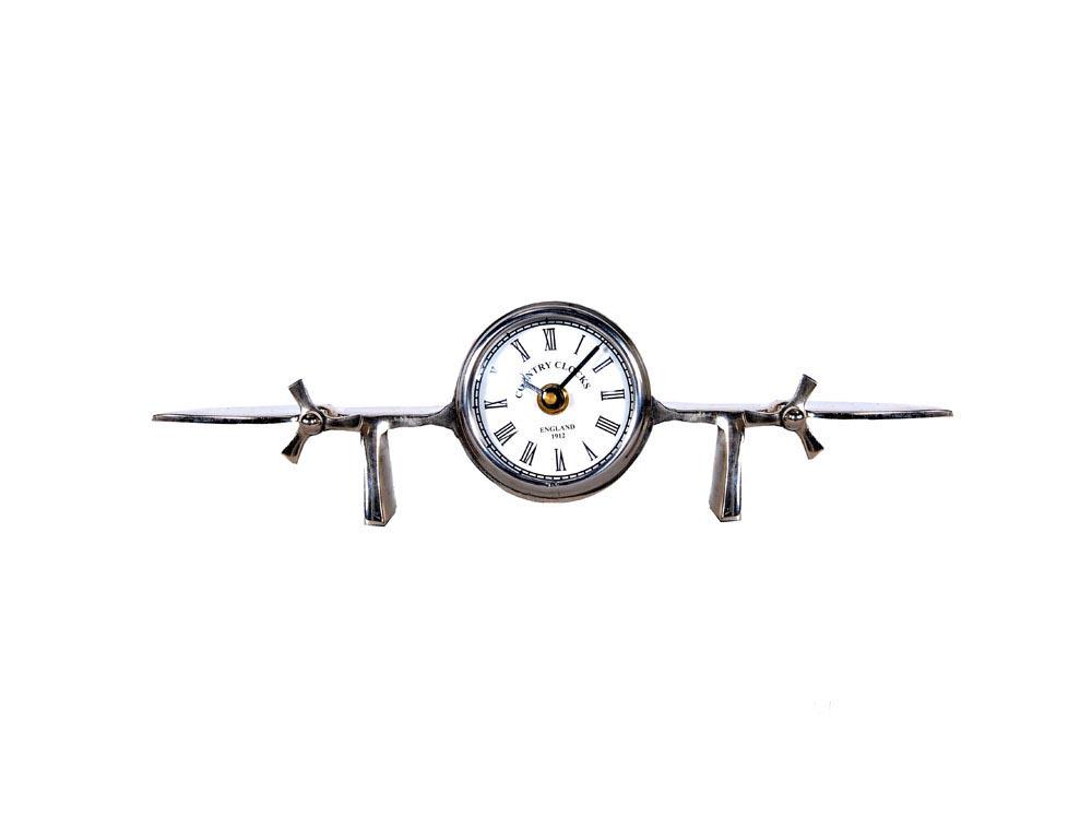 Aeroplane Table Clock: Aeroplane Table Clock -- This unique aeroplane clock comes with the clock in the center of the wings. It features 100% hand-cast in solid aluminum and topped with a nickel-plated finish. The clock run