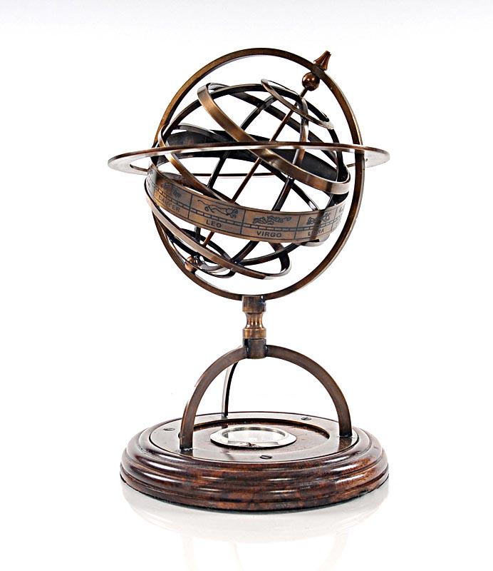 BRASS ARMILLERY WITH COMPASS ON NTRL SHEESHAM BASE: BRASS ARMILLERY WITH COMPASS ON NTRL SHEESHAM BASE -- Armillary globe with a brass finish reflects the craftsmanship and skill of ancient Greeks who sought to understand time and the way of the planet