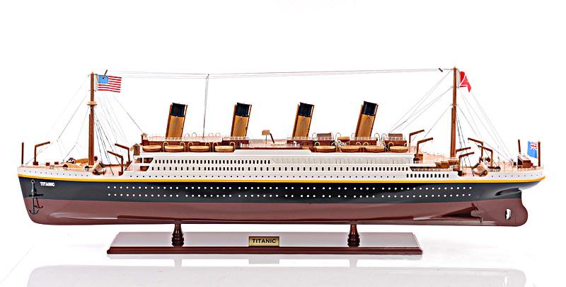 ?Titanic Painted L142: ?Titanic Painted L142 -- This is an XL and most accurate model of the famous RMS Titanic. The model is 100% hand built from scratch using ?plank on frame? construction method. Our master craftsmen hav