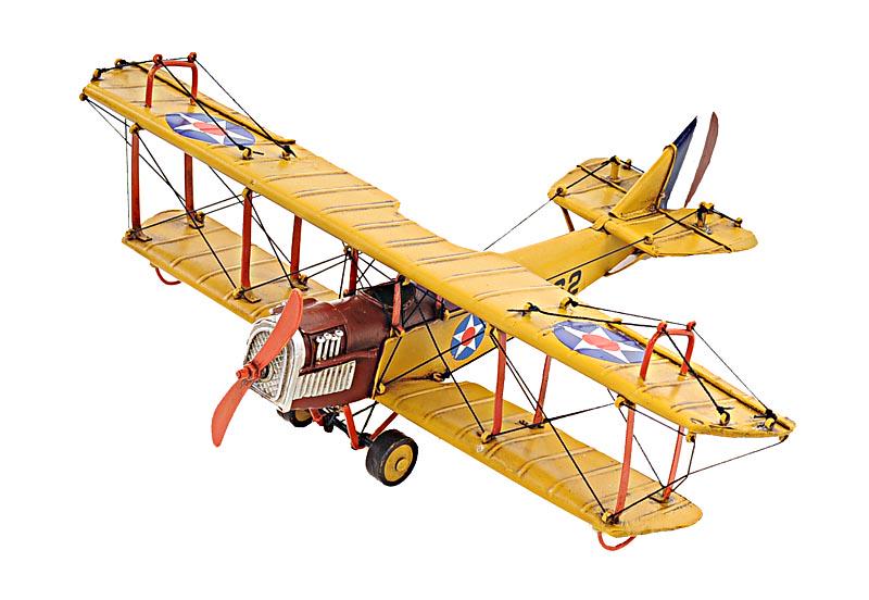 1918 YELLOW CURTISS JN-4 1:24: 1918 YELLOW CURTISS JN-4 1:24 -- The Curtiss JN-4 Jenny was one of a series of JN biplanes built by the Curtiss Aeroplane Company of Hammondsport New York. This fighter bi-plane was one of the most ca