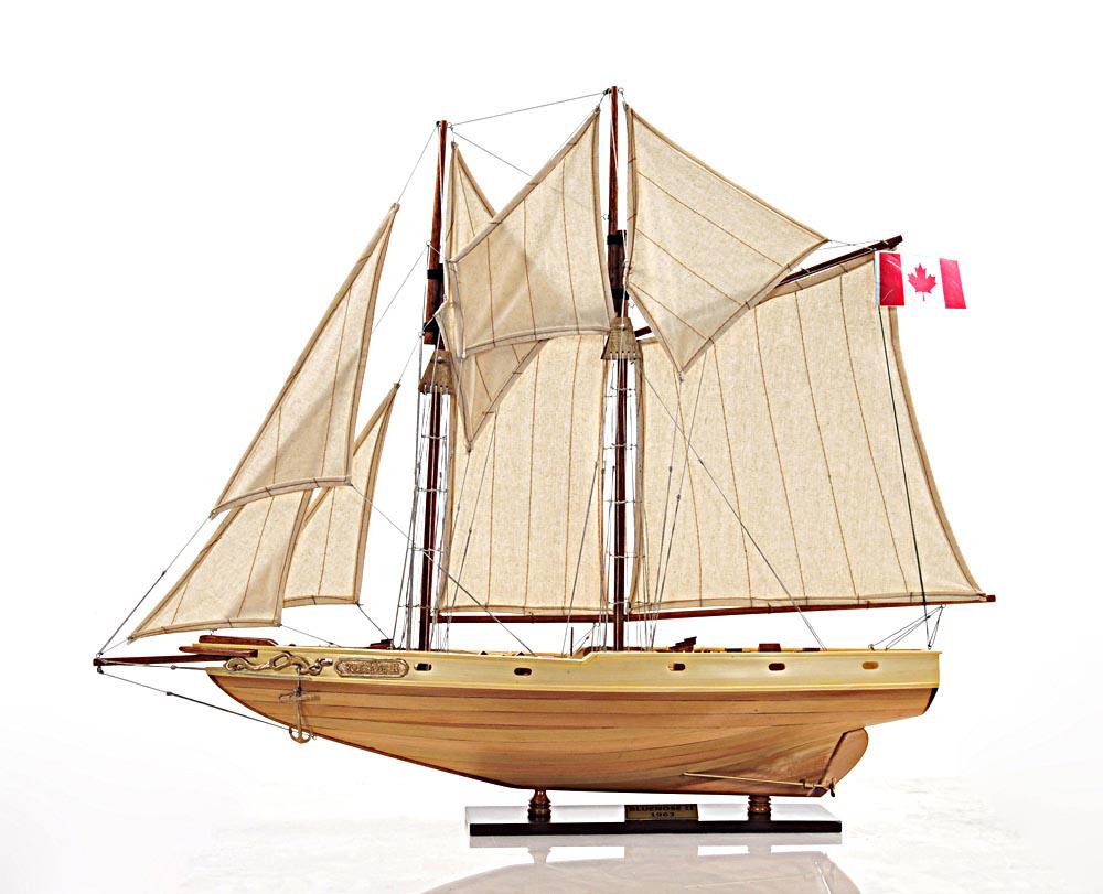 Bluenose II Fully assembled L60: Bluenose II Fully assembled L60 -- This is a beautiful FULLY ASSEMBLED Bluenose II in natural wood finish. It has wooden booms connected to the main and foremast. All the sails are rigged beautifully 