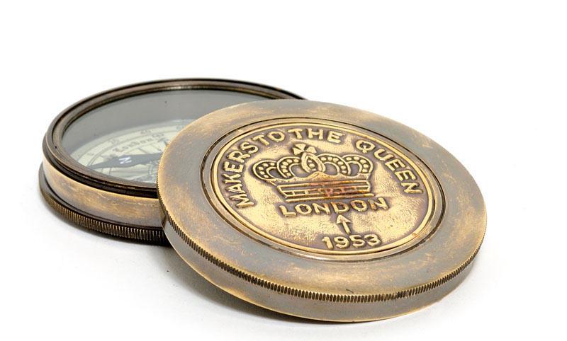 Makers to the Queen Compass w leather case: Makers to the Queen Compass w leather case -- This is a fully functional replica of the Poem Compass made by Makers to the Queen 1953. Inside is a poem The Road Not Taken written by famous poet Robert