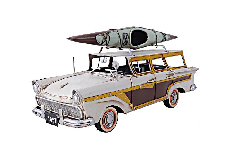 FORDS WOODY-LOOK COUNTRY SQUIRE W/ KAYAK: FORDS WOODY-LOOK COUNTRY SQUIRE W/ KAYAK -- Travel back in time with this classic 1957 Ford Woody-look Country Squire model. The best selling American made wagon of its time. It is made of iron and ha