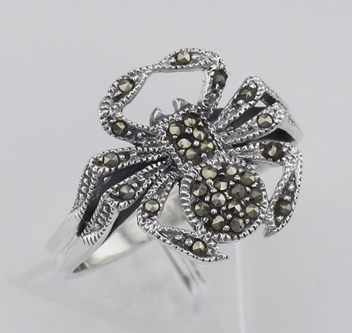 Marcasite Spider Ring - Sterling Silver: Marcasite Spider Ring - Sterling Silver **|**|** #R-413 Metal : Sterling Silver | Stone : Marcasite | Shape : Spider | Style : Ring | Height : 5/8 inch | Width : 5/8 inch | Approximate Weight : 3 gram