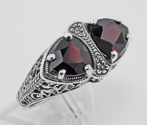 Unique Art Deco Style Trillion Cut Genuine Garnet Filig: Unique Art Deco Style Trillion Cut Genuine Garnet Filig **|**|** #FR-751-G This Vintage style garnet filigree ring is hand crafted and finished in intricate sterling silver detail. Filigree rings are 