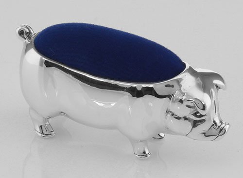 Antique Style Pig Pin Cushion in Fine Sterling Silver: Antique Style Pig Pin Cushion in Fine Sterling Silver **|**|** #X-006 Sterling Silver Antique Style Pig Pin Cushion. Cushion currently is either navy blue or black velvet. Pig measures approx. 1 3/4 i