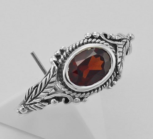 Garnet Ring - Sterling Silver: Garnet Ring - Sterling Silver **|**|** #R-1235-G Metal : Sterling Silver | Stone : Garnet | Style : Ring | Height : 3/8 inch | Width : 3/4 inch | Approximate Weight : 2.3 grams | Carat : Approx 1/2 Ca