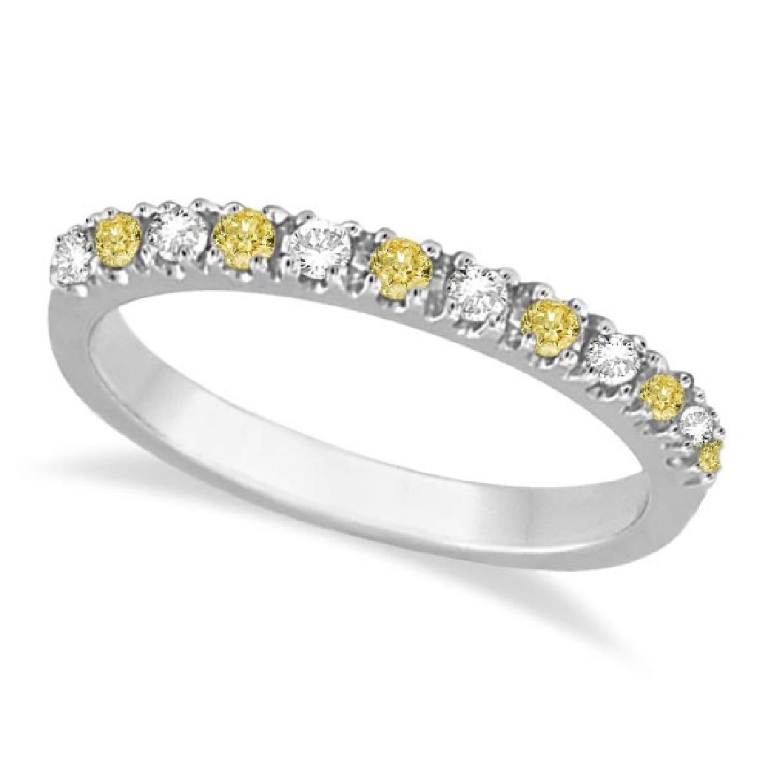 Yellow Canary and White Diamond Stackable Ring Band 14k: Yellow Canary and White Diamond Stackable Ring Band 14k **|**|** CENTER STONE; Diamond CENTER STONE CLARITY; SI CENTER STONE COLOR; Yellow CENTER STONE SETTING; Prong SIDE STONE CLARITY; SI SIDE STONE