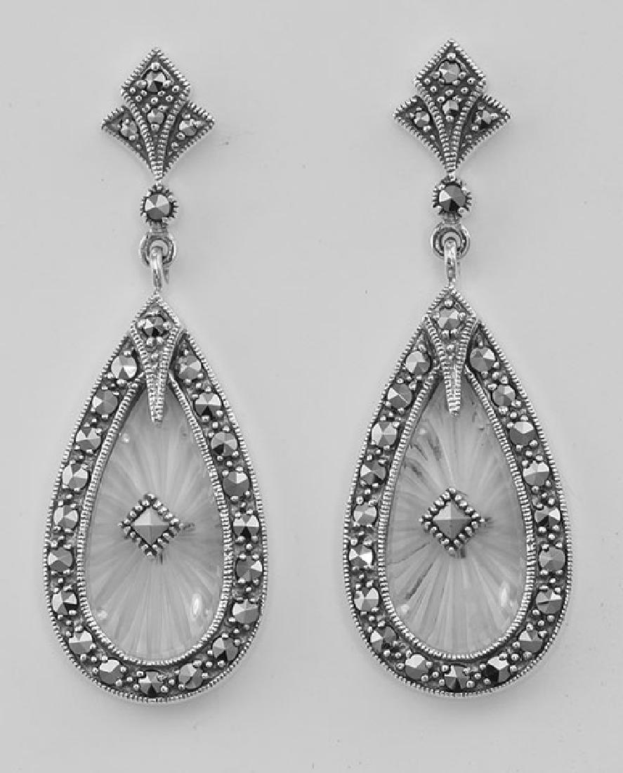 Sunray Crystal and Marcasite Filigree Earrings - Sterli: Sunray Crystal and Marcasite Filigree Earrings - Sterli **|**|** #FE-6211 Sterling Silver Sunray Crystal Filigree Earrings with Marcasite have a hanging length of approx. 1 3/4 inches and measure 1/2 