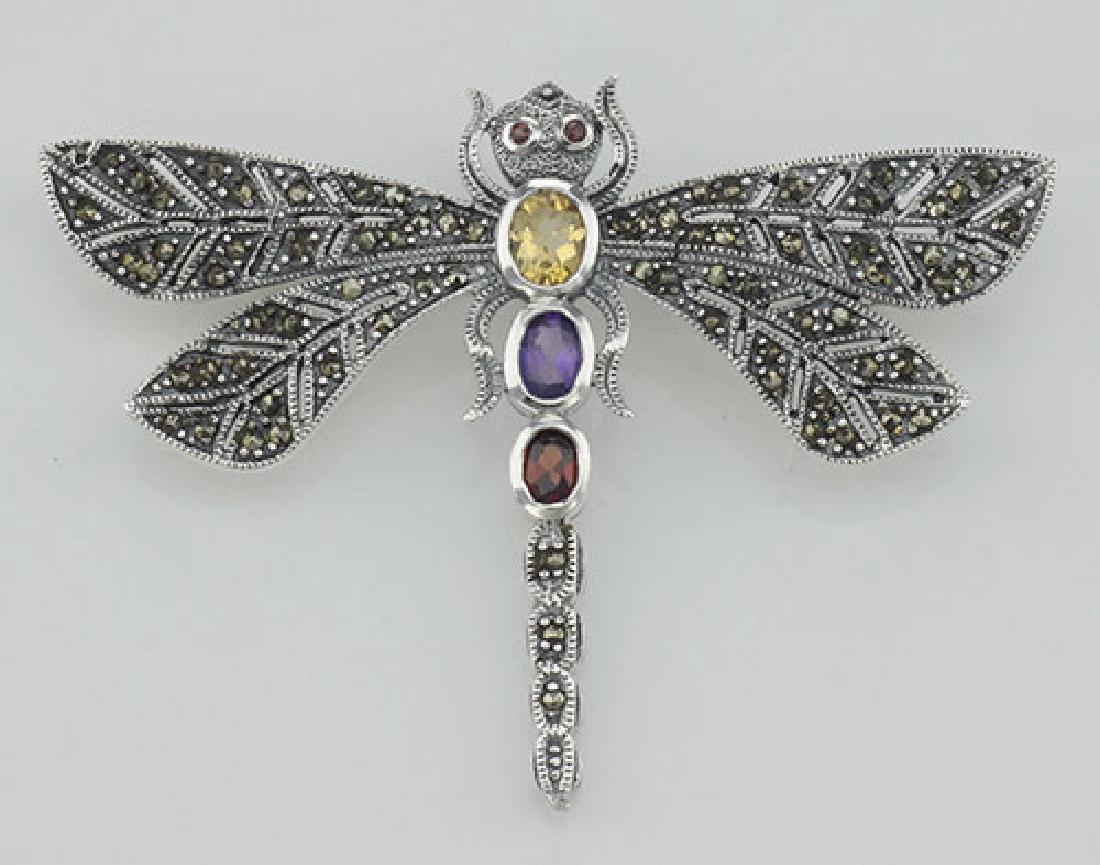 Multi Gemstone Marcasite Dragonfly Pin Sterling Silver: Multi Gemstone Marcasite Dragonfly Pin Sterling Silver **|**|** #P-139 Sterling Silver Multi Stone Dragonfly Pin / Brooch with Citrine, Amethyst and Garnet. This beautiful pin features 3 oval gemstone