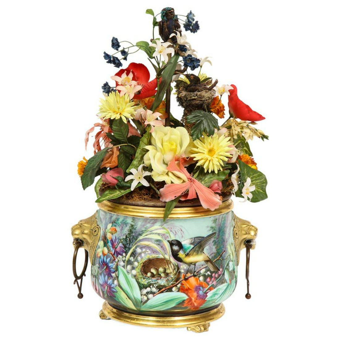 Blaise Bontems, An Extremely Fine & Rare Automaton: Blaise Bontems, An Extremely Fine & Rare Automaton Double Singing Bird Music Box, in the form of a Porcelain Jardiniere, 1870-1880, Paris. Bird with turquoise plumage, articulated head, beak and t