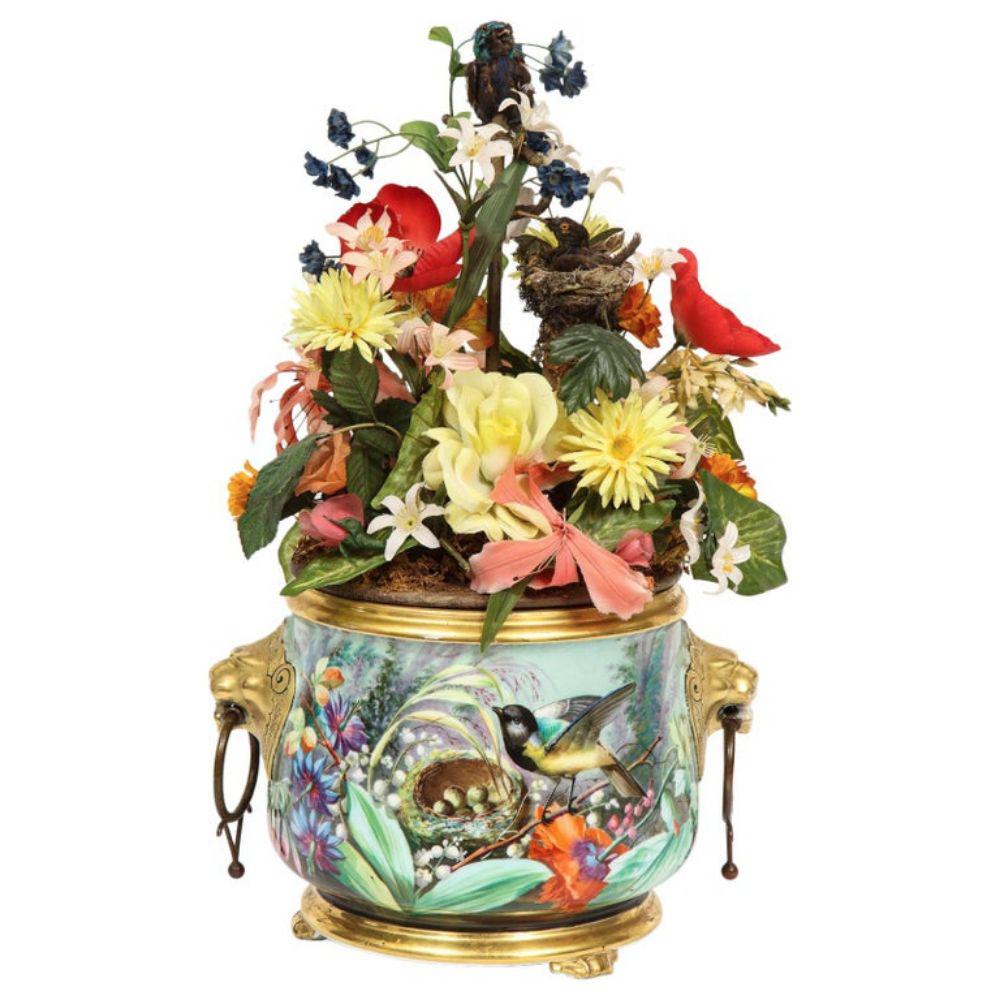 Blaise Bontems, An Extremely Fine & Rare Automaton: Blaise Bontems, An Extremely Fine & Rare Automaton Double Singing Bird Music Box, in the form of a Porcelain Jardiniere, 1870-1880, Paris. Bird with turquoise plumage, articulated head, beak and t