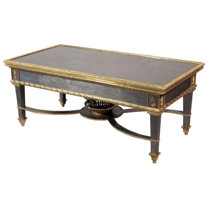Louis XVI Style French Ormolu-Mounted Steel Coffee: Louis XVI style French ormolu-mounted steel coffee low tableProbably designed by John Vesey or Maison Jansen.This simply stunning Hollywood Regency coffee table leaves no stone Un-turned as its sleek