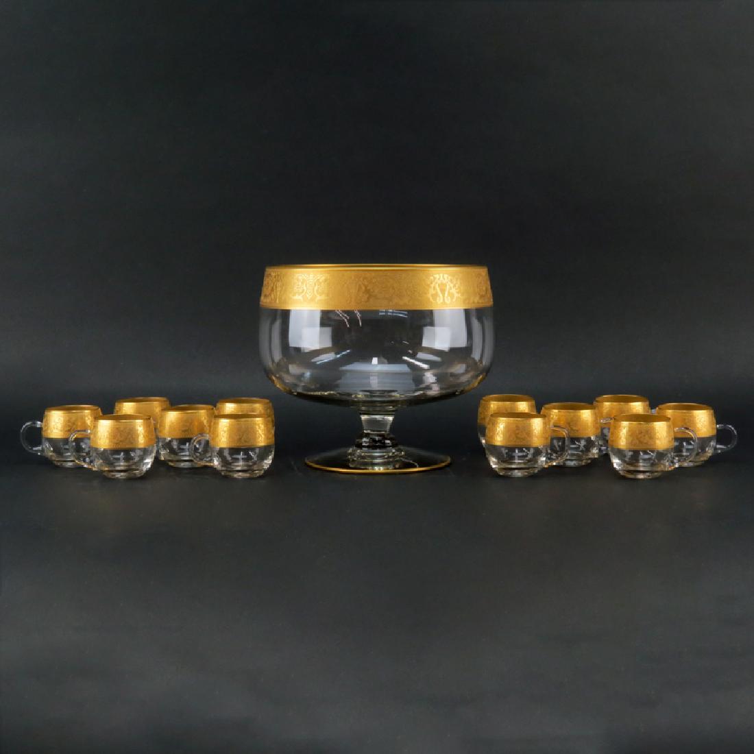 Vintage Mid Century Glass Punch Bowl Set With Gold Band: Vintage Mid Century Glass Punch Bowl Set With Gold Band Rim. Consists of Bowl and 12 cups. Unsigned. Good condition. Bowl measures 8-1/4", cups 2-1/2". Provenance: Property of Irving Cowan and the lat