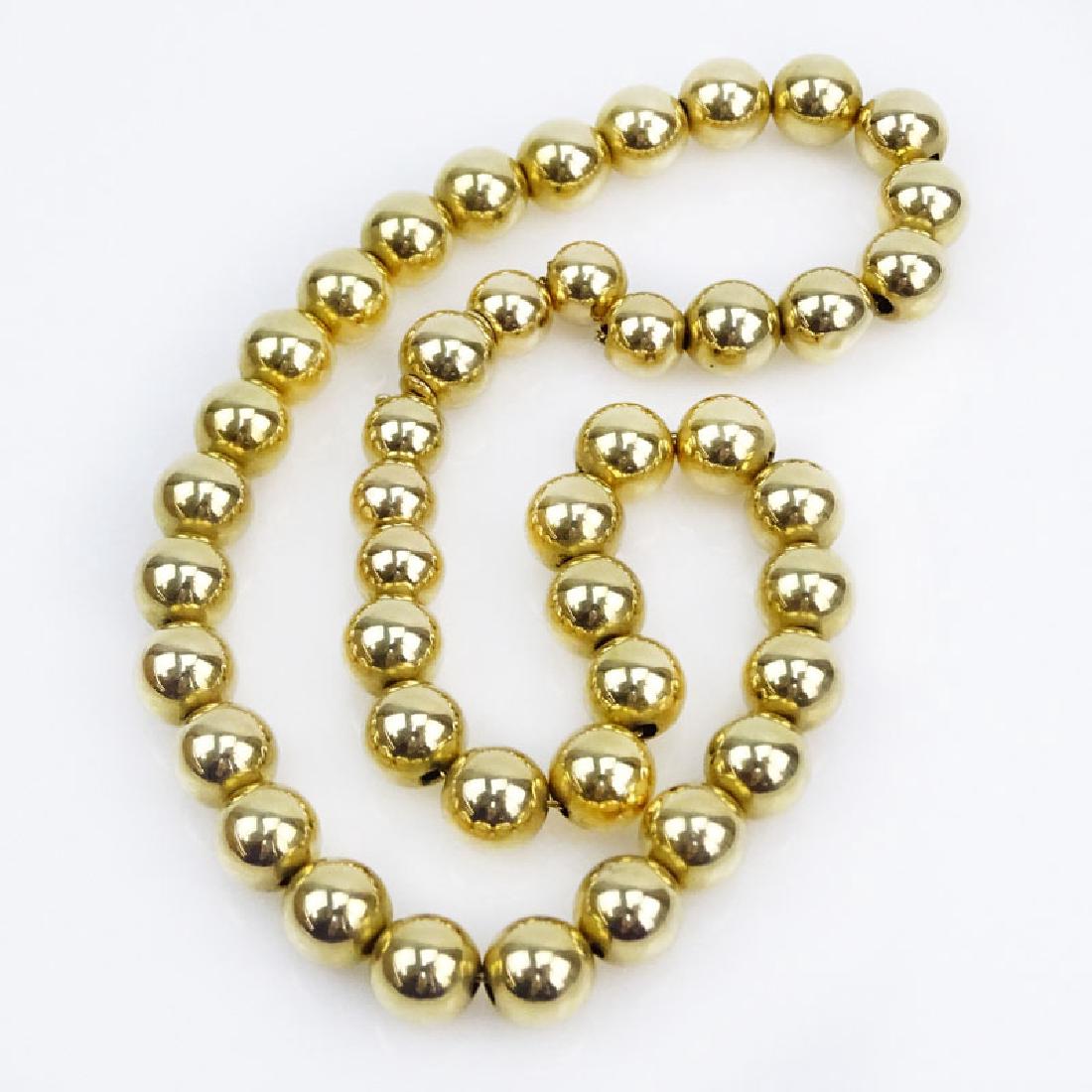 Vintage 14 Karat Yellow Gold Graduated Bead Necklace. (1 of 2)