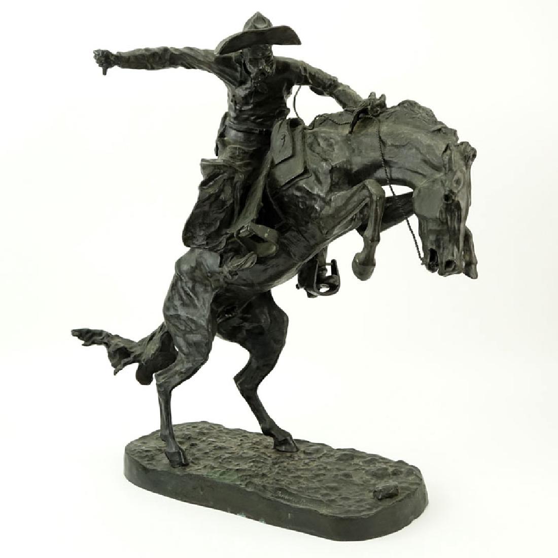 After: Frederic Remington, American (1861-1909) Bronze: After: Frederic Remington, American (1861-1909) Bronze "Bronco Buster" Signed. Losses to whip. Measures 21" H. Shipping: Third party. (estimate $300-$400)