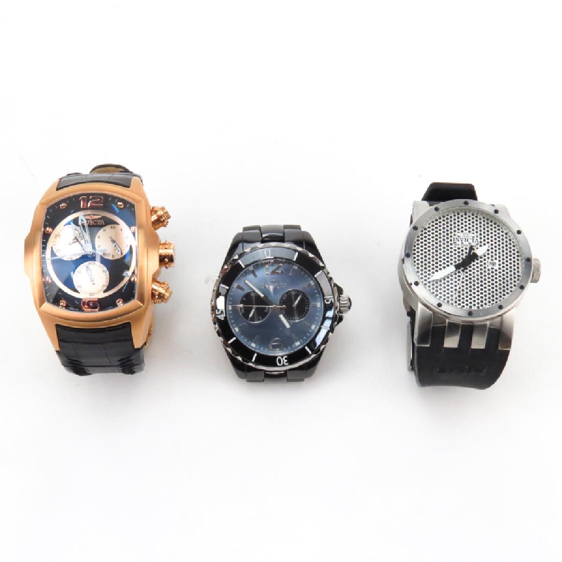 Three (3) Men's Invicta Watches. Includes: DNA Mesh: Three (3) Men's Invicta Watches. Includes: DNA Mesh Stainless Steel and Rubber Strap Watch, 46mm case; Model 0307 Trinite Chronograph Anodized Steel Bracelet Watch, 47mm case; Lupah Chronograph Model
