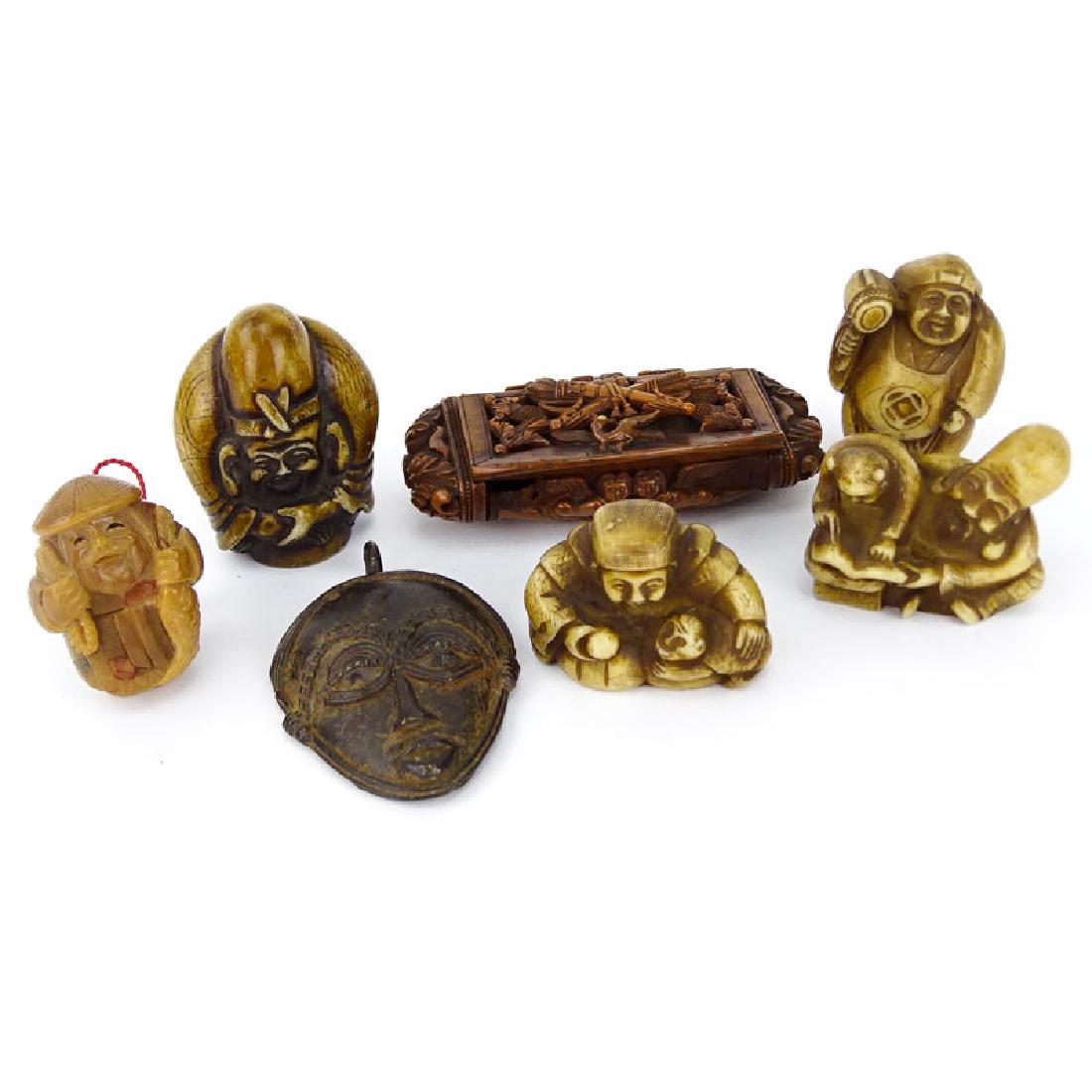 Collection of Four (4) Vintage Japanese Carved Bone: Collection of Four (4) Vintage Japanese Carved Bone Netsuke, a Carved Horn Netsuke, a Carved Horn Snuff Box and an African Iron Mask Pendant. Unsigned. Small loss to snuff box. Tallest netsuke measure