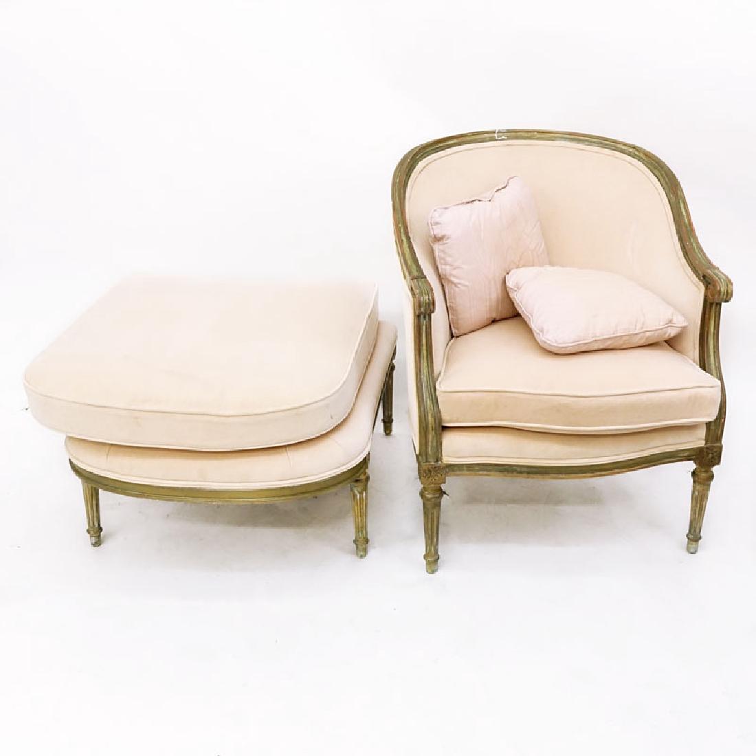Mid to Late 20th C. Louis XVI Style Carved and: Mid to Late 20th C. Louis XVI Style Carved and Upholstered Barrel Back Bergere Chair and Ottoman. Painted frame with rosettes on fluted tapering legs. Stains to upholstery, scuffs and rubbing to frame