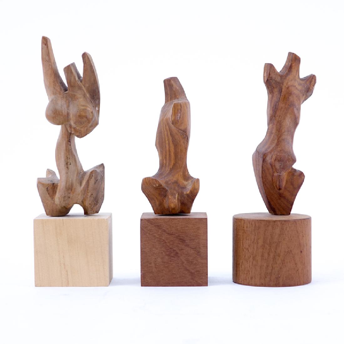 Three Mid-Century Carved Wood Figural Sculptures. (1 of 5)