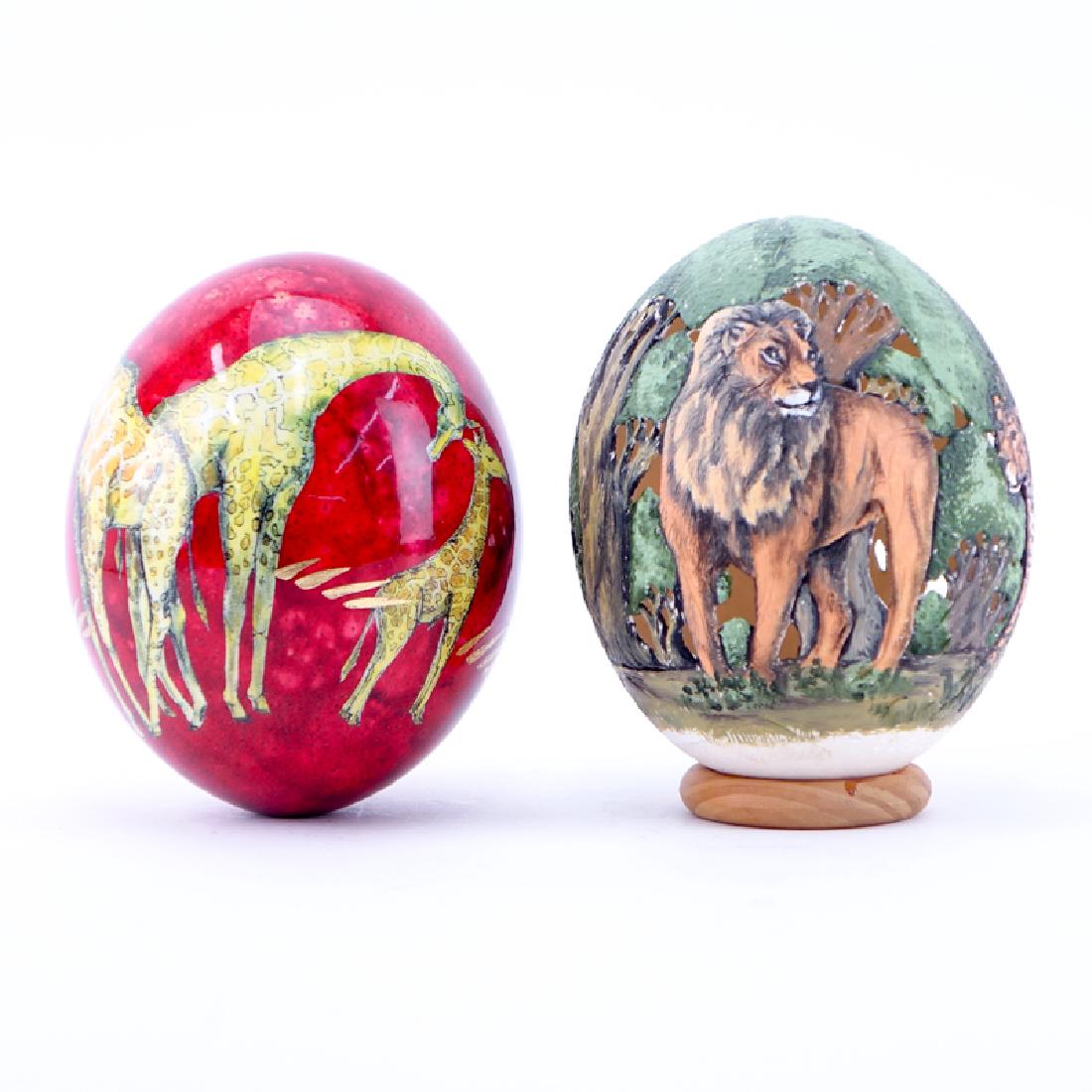 Grouping of Two (2) Painted Ostrich Eggs. One is signed (1 of 3)