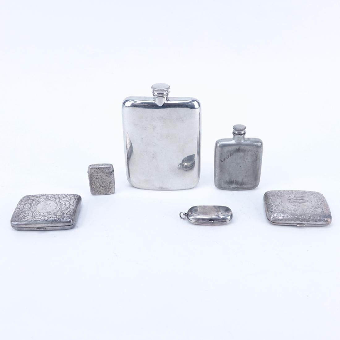 Collection of Four (4) Sterling Silver Cases Along With: Collection of Four (4) Sterling Silver Cases Along With Two (2) Silver Plated Flasks. Sterling cases signed, good condition and weigh approx. 6.7 troy ounces. One flask signed Ambercrombie & Fitch Co.