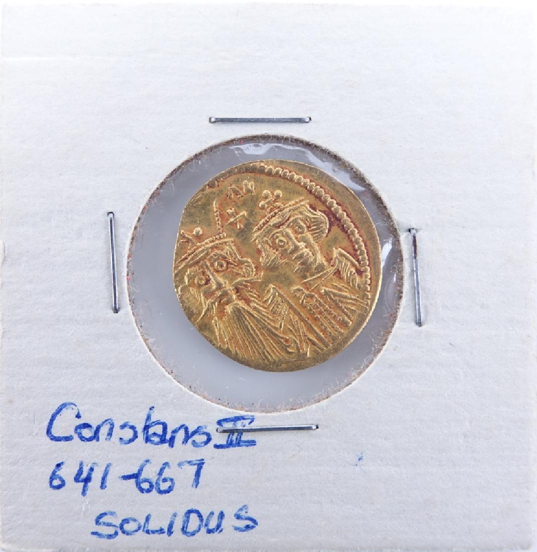 Byzantine Empire: Constans II (A.D 641-688) Gold: Byzantine Empire: Constans II (A.D 641-688) Gold Solidus in Coin Display. Mint of Constantinople. Depicts Crowned and draped facing busts of Constans and Constantine with cross above, verso has Heracl