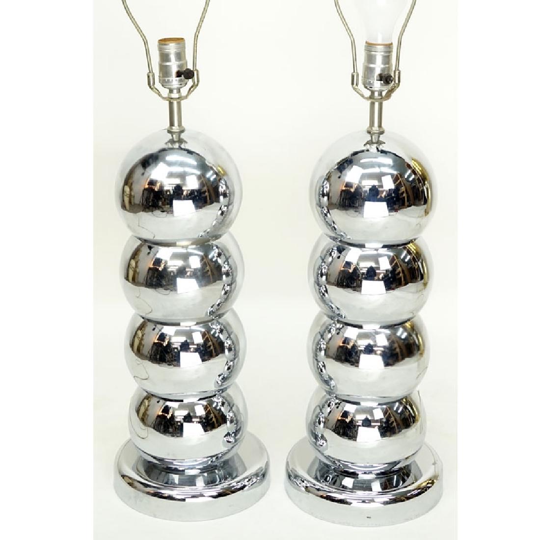 Pair of Mid Century Modern George Kovacs Style, Chrome: Pair of Mid Century Modern George Kovacs Style, Chrome Stacked Ball Lamps. Typical pitting to surface or else good condition. Overall measures 30" H. Shipping: Third party. (estimate $100-$200)