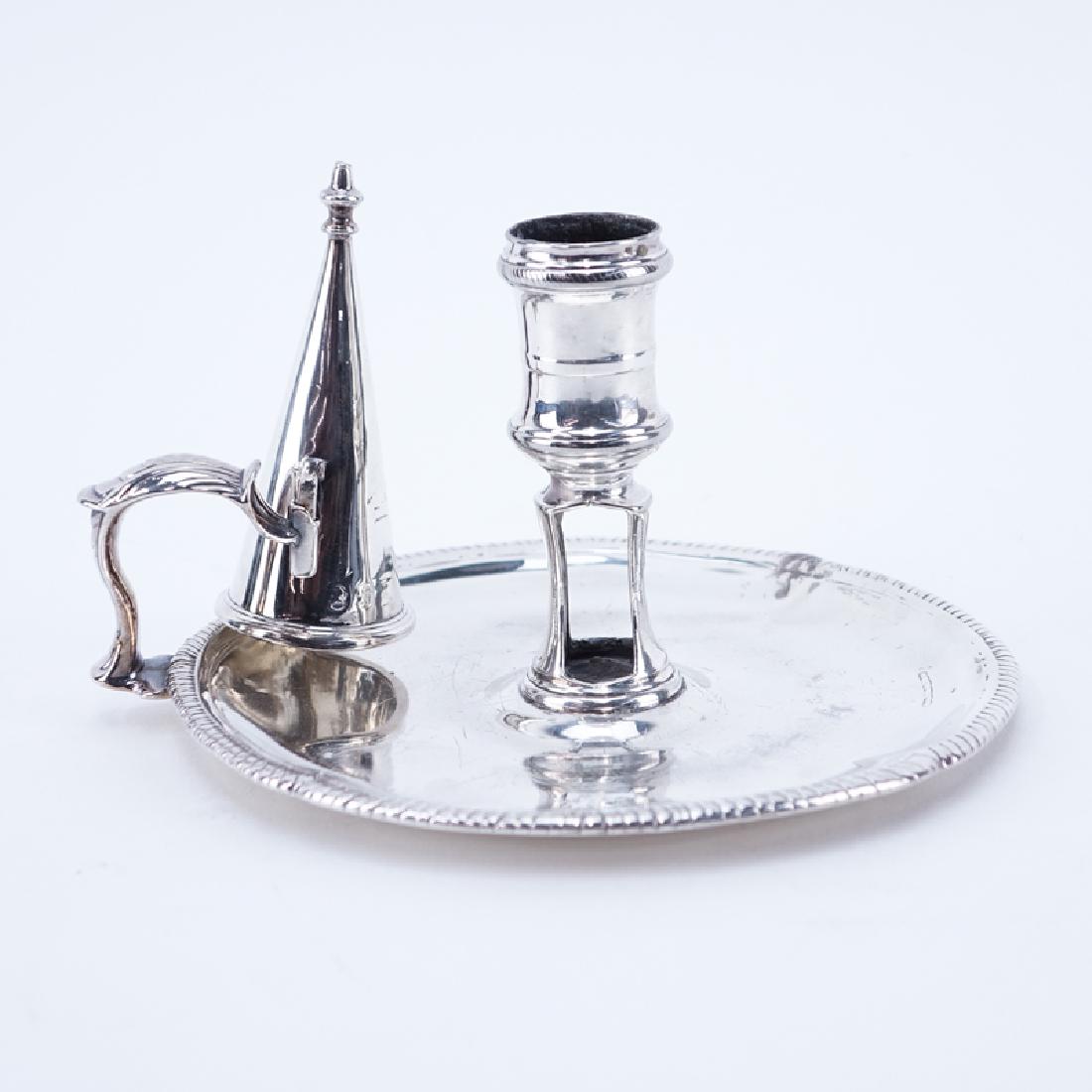 Early 20th Century English Silver Candleholder With: Early 20th Century English Silver Candleholder With Snuffer. Signed with English hallmarks, London 1905. Typical small dings from age and use. Measures 3-1/4" H and weighs approx. 9.59 troy ounces. Sh