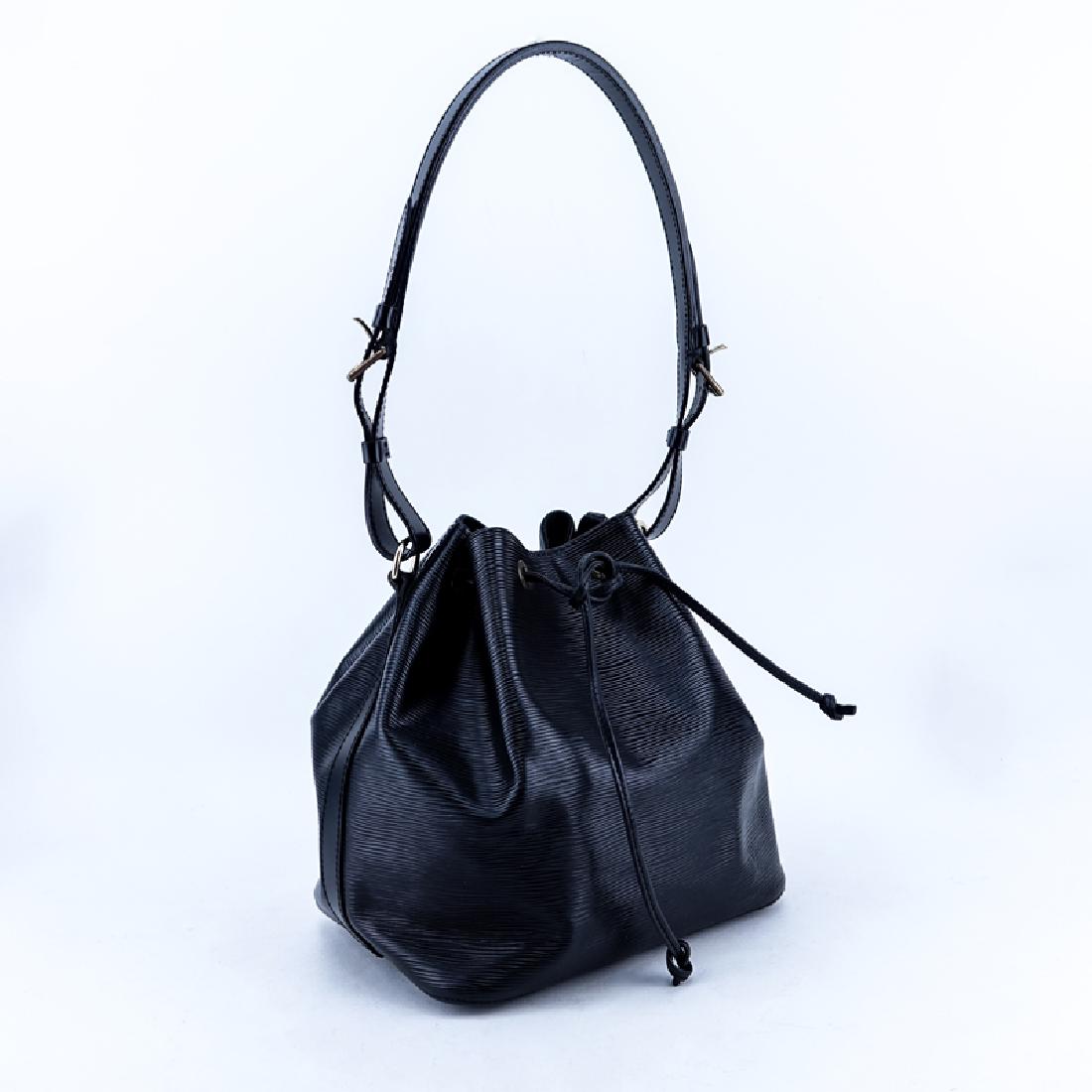 Louis Vuitton Black Leather Noe PM Shoulder Bag.: Louis Vuitton Black Leather Noe PM Shoulder Bag. Golden brass hardware, black suede interior. Labeled appropriately. Very good condition with only slight signs of wear. Shipping $52.00 (estimate $400-