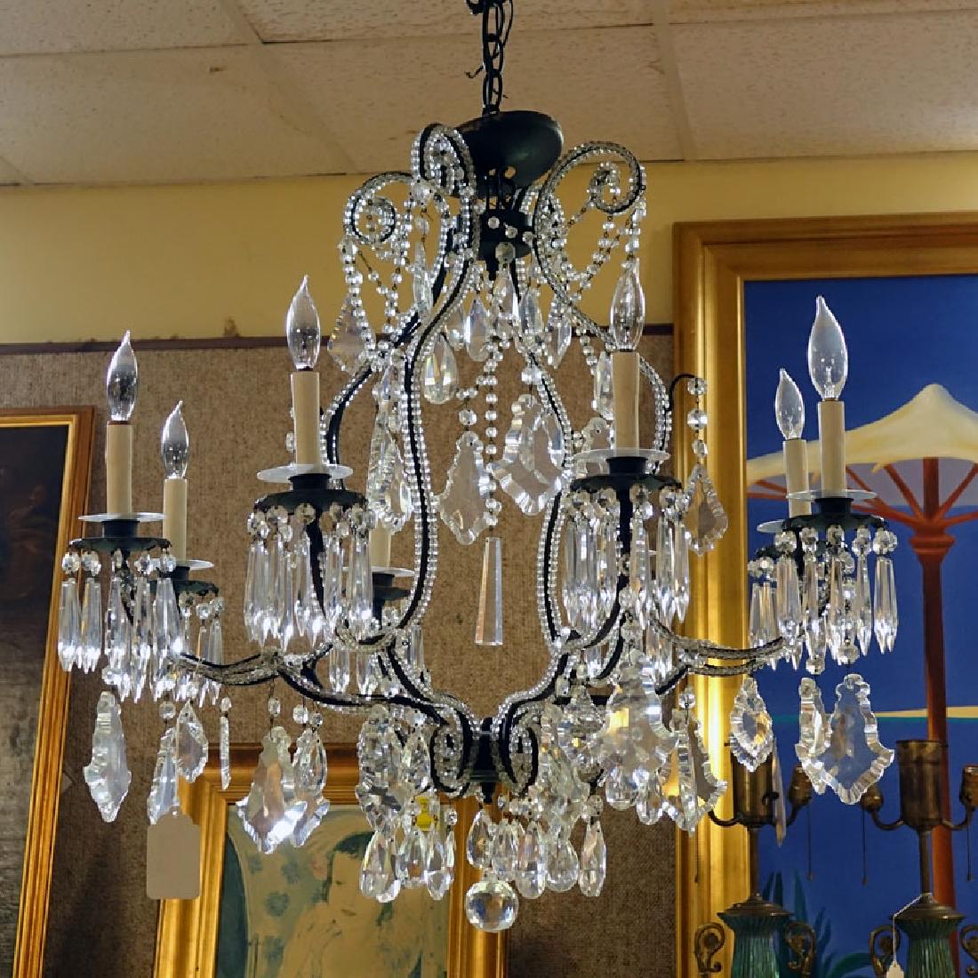 Antique Style Beaded Chandelier With Hanging Prisms.