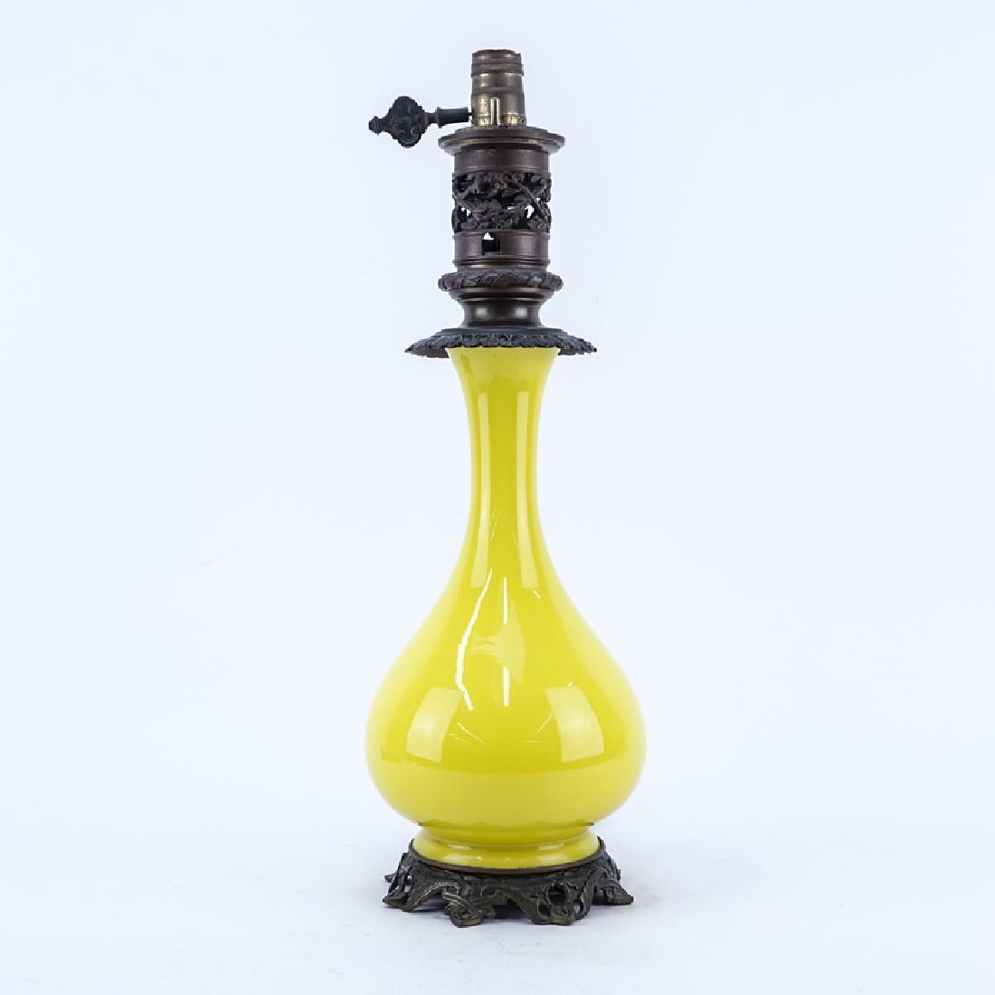 Vintage Yellow Opaline Glass Vase Mounted As Lamp.: Vintage Yellow Opaline Glass Vase Mounted As Lamp. Has hardware for an oil lamp and electrified. Good condition. Measures 21" H. Shipping: Third party. (estimate $50-$100)